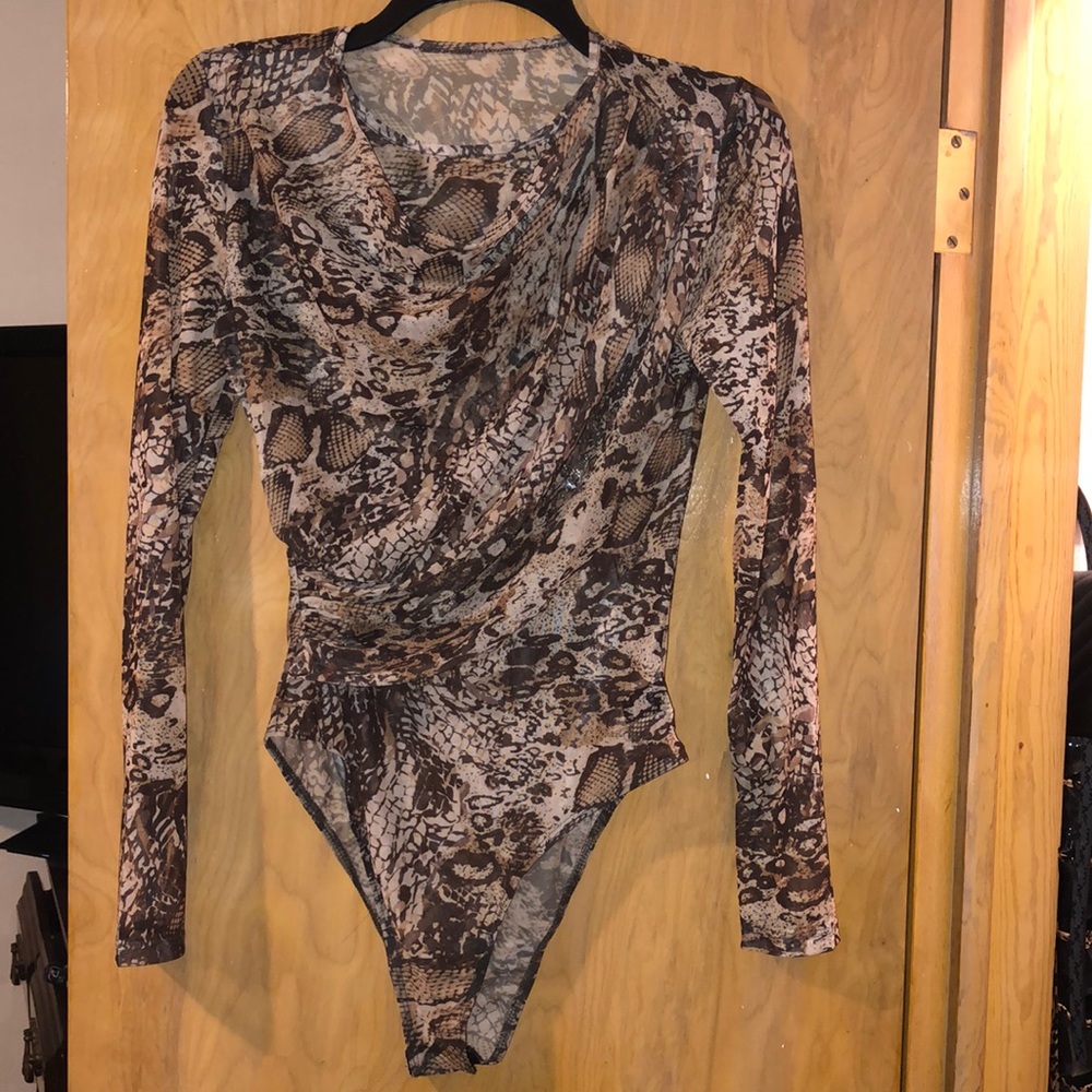 Leopard and snakeskin print mesh body suit.